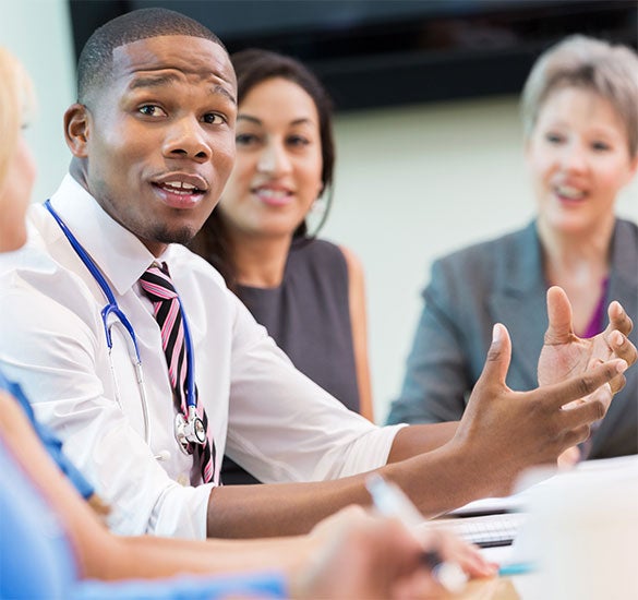 people at a table collaborating