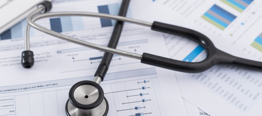 Stethoscope resting on forms