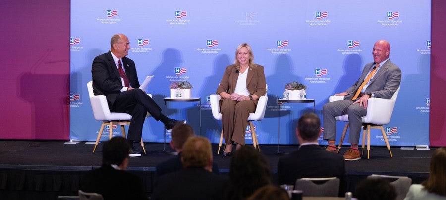 Panel discussion featuring HA Board Immediate Past Chair Tina Freese Decker, president and CEO, Corewell Health, and Rob Allen, president and CEO, Intermountain Health, participated in a discussion moderated by Jim Skogsbergh, former chair of the AHA Board of Trustees.