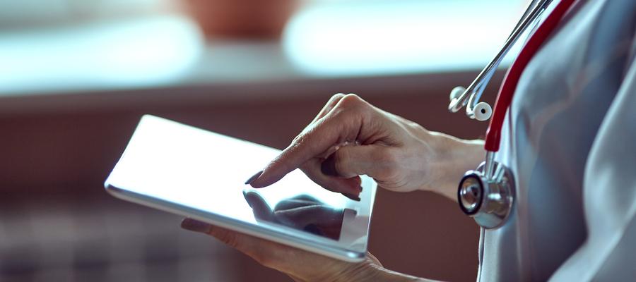 finger tapping on portable tablet